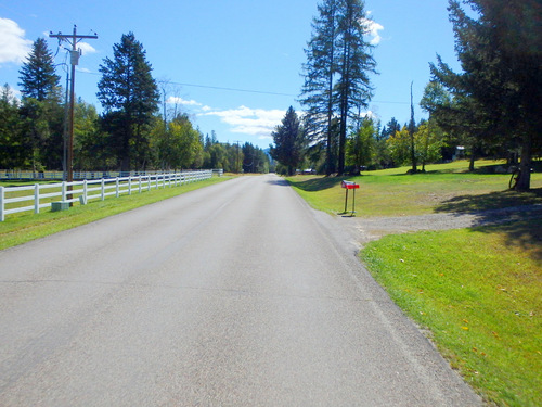 Riding through the suburbs of the town of Swan River.